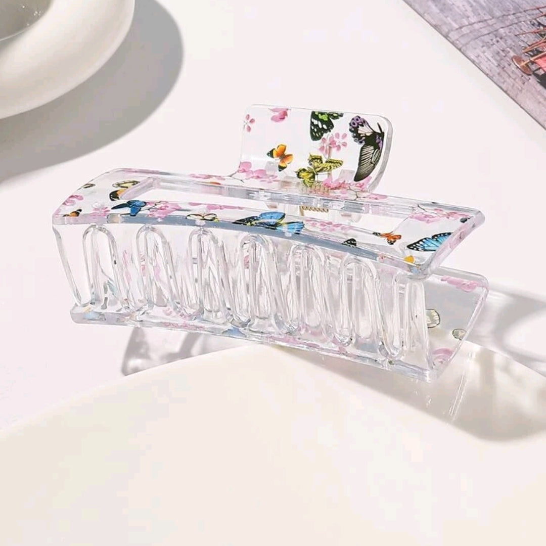 Transparent medium sized hair claw with flowers and butterflies